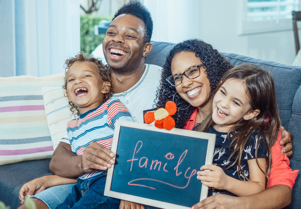 family with sign