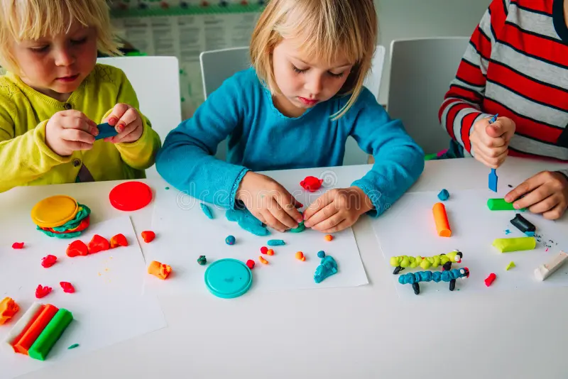 children with play dough